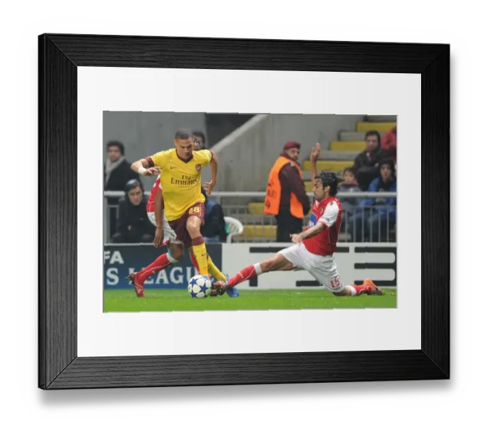 Framed Print : Kieran Gibbs (Arsenal) Miguel Garcia (Braga). SC Braga 2: 0 Arsenal, UEFA Champions League