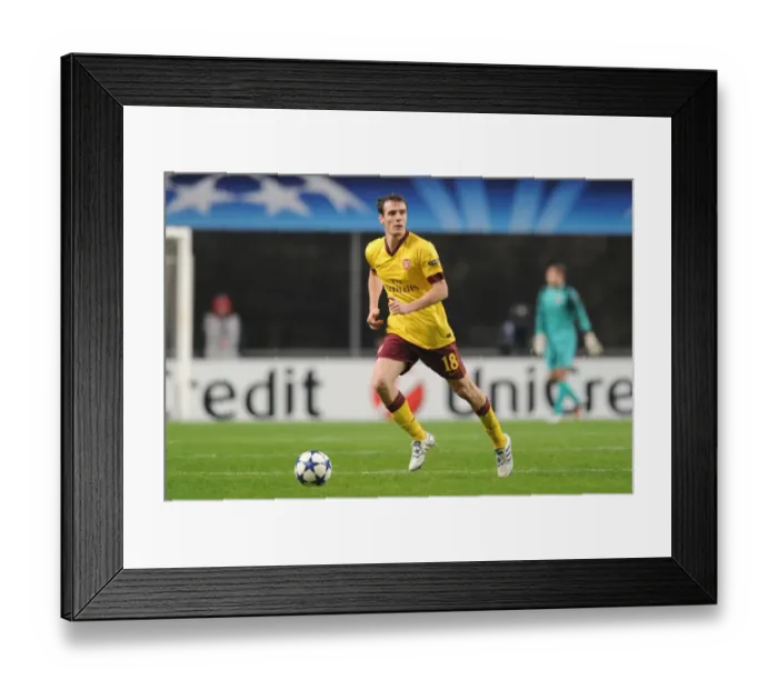 Framed Print : Sebastien Squillaci (Arsenal). SC Braga 2: 0 Arsenal, UEFA Champions League