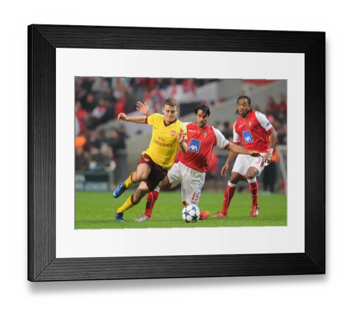 Framed Print : Jack Wilshere (Arsenal) Miguel Garcia (Braga). SC Braga 2: 0 Arsenal, UEFA Champions League Framed Print : Jack Wilshere (Arsenal) Miguel Garcia (Braga). SC Braga 2: 0 Arsenal, UEFA Champions League