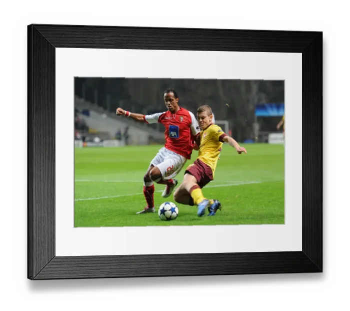 Framed Print : Jack Wilshere (Arsenal) Leandro Salino (Braga). SC Braga 2: 0 Arsenal, UEFA Champions League Framed Print : Jack Wilshere (Arsenal) Leandro Salino (Braga). SC Braga 2: 0 Arsenal, UEFA Champions League