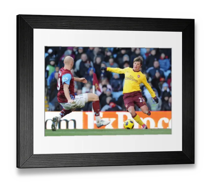 Framed Print : Andrey Arshavin (Arsenal) James Collins (Villa). Aston Villa 2: 4 Arsenal Framed Print : Andrey Arshavin (Arsenal) James Collins (Villa). Aston Villa 2: 4 Arsenal