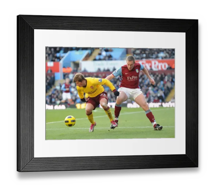 Framed Print : Andrey Arshavin (Arsenal) Richard Dunne (Villa). Aston Villa 2: 4 Arsenal