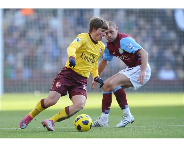 Andrey Arshavin (Arsenal) Luke Young (Villa). Aston Villa 2: 4 Arsenal. Barclays Premier League