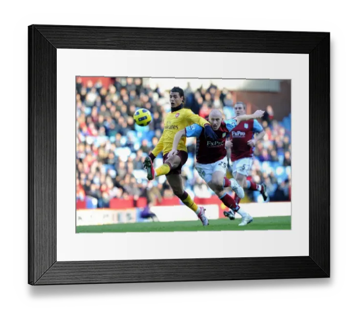 Framed Print : Chamakh's Brilliant Performance: Arsenal Crush Villa 4-2 in Premier League Showdown