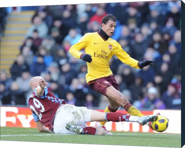 Marouane Chamakh (Arsenal) James Collins (Villa). Aston Villa 2: 4 Arsenal