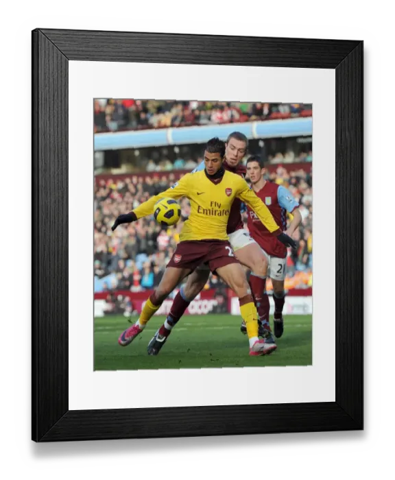 Framed Print : Arsenal's Chamakh Shines: 4-2 Victory Over Aston Villa in Premier League Clash
