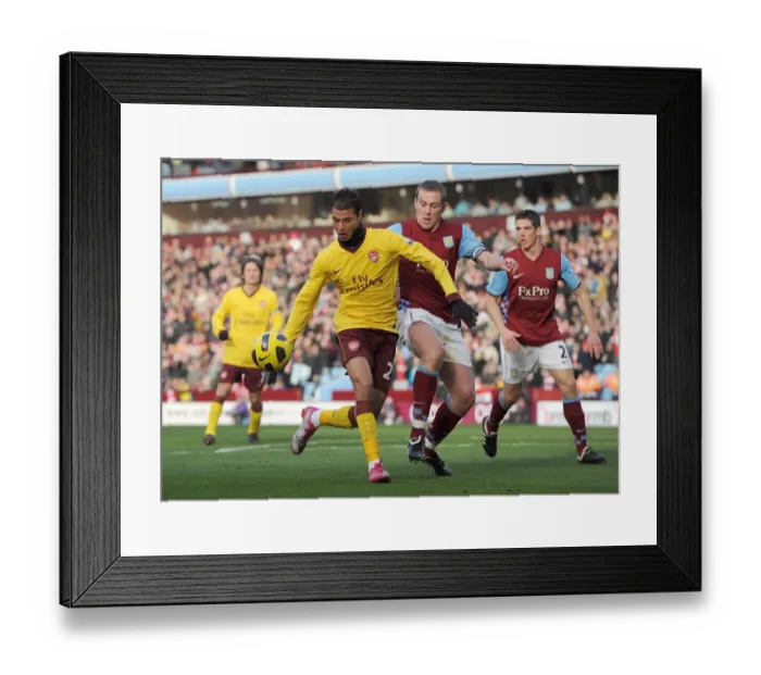 Framed Print : Marouane Chamakh (Arsenal) Richard Dunne (Villa). Aston Villa 2: 4 Arsenal Framed Print : Marouane Chamakh (Arsenal) Richard Dunne (Villa). Aston Villa 2: 4 Arsenal