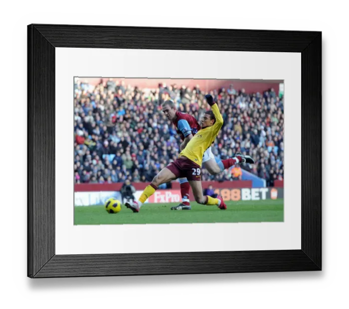Framed Print : Marouane Chamakh scores Arsenals 3rd goal under pressure from Richard Dunne (Villa) Framed Print : Marouane Chamakh scores Arsenals 3rd goal under pressure from Richard Dunne (Villa)