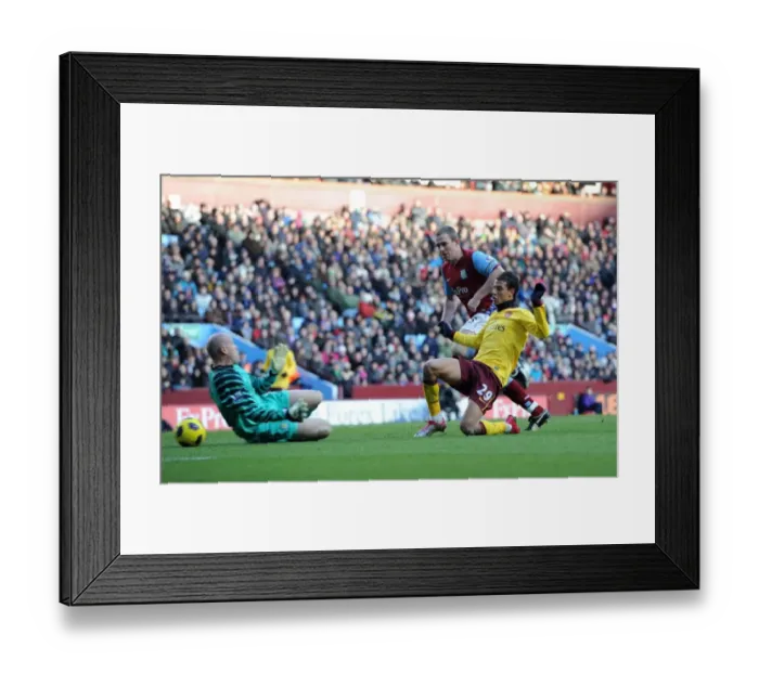 Framed Print : Andrey Arshavin scores Arsenals 1st goal past Brad Friedel under pressure from James Collins Framed Print : Andrey Arshavin scores Arsenals 1st goal past Brad Friedel under pressure from James Collins