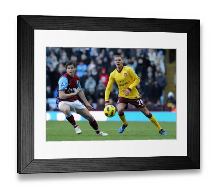 Framed Print : Kieran Gibbs (Arsenal) Chris Herd (Villa). Aston Villa 2: 4 Arsenal. Barclays Premier League Framed Print : Kieran Gibbs (Arsenal) Chris Herd (Villa). Aston Villa 2: 4 Arsenal. Barclays Premier League