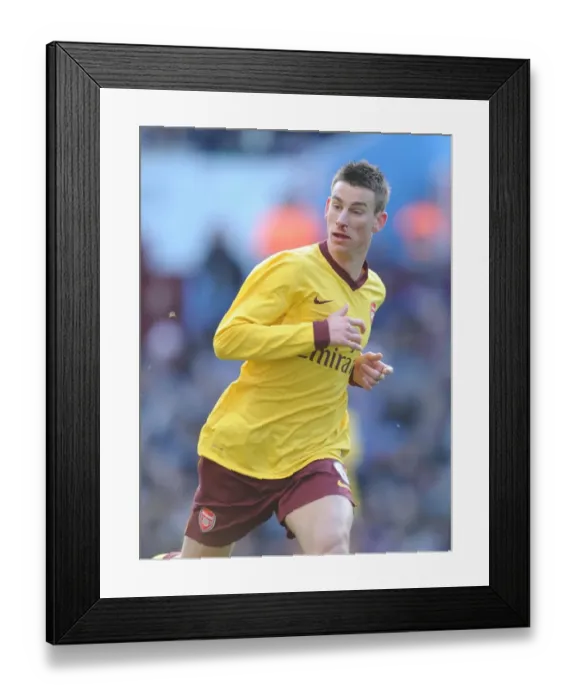 Framed Print : Laurent Koscielny (Arsenal). Aston Villa 2: 4 Arsenal. Barclays Premier League Framed Print : Laurent Koscielny (Arsenal). Aston Villa 2: 4 Arsenal. Barclays Premier League