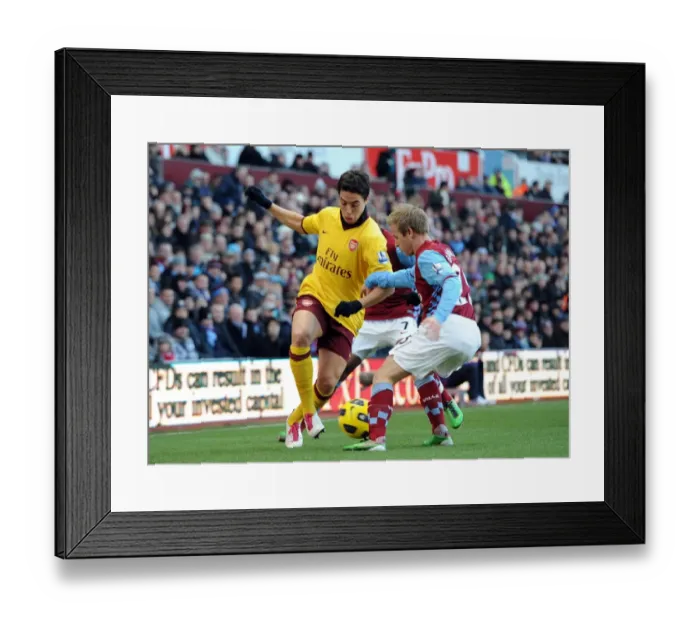 Framed Print : Samir Nasri (Arsenal) nutmegs Barry Bannan (Villa). Aston Villa 2: 4 Arsenal Framed Print : Samir Nasri (Arsenal) nutmegs Barry Bannan (Villa). Aston Villa 2: 4 Arsenal