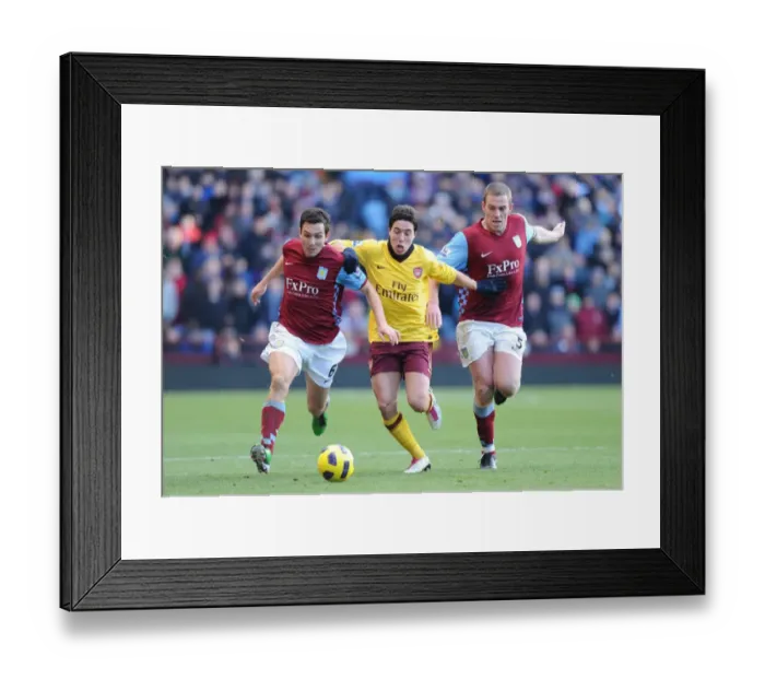 Framed Print : Samir Nasri (Arsenal) Stewart Downing and Richard Dunne (Villa). Aston Villa 2: 4 Arsenal