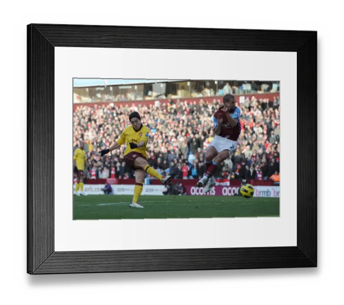 Framed Print : Samir Nasri scores Arsenals 2nd goal under pressure from Luke Young (Villa)