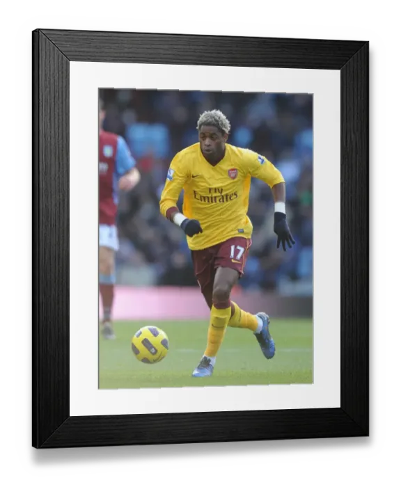 Framed Print : Alex Song (Arsenal). Aston Villa 2: 4 Arsenal. Barclays Premier League. Villa Park