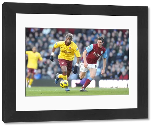 Alex Song (Arsenal) Ciaran Clark (Villa). Aston Villa 2: 4 Arsenal. Barclays Premier League