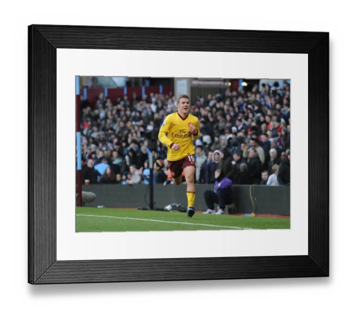 Framed Print : Jack Wilshere celebrates scoring Arsenals 4th goal. Aston Villa 2: 4 Arsenal