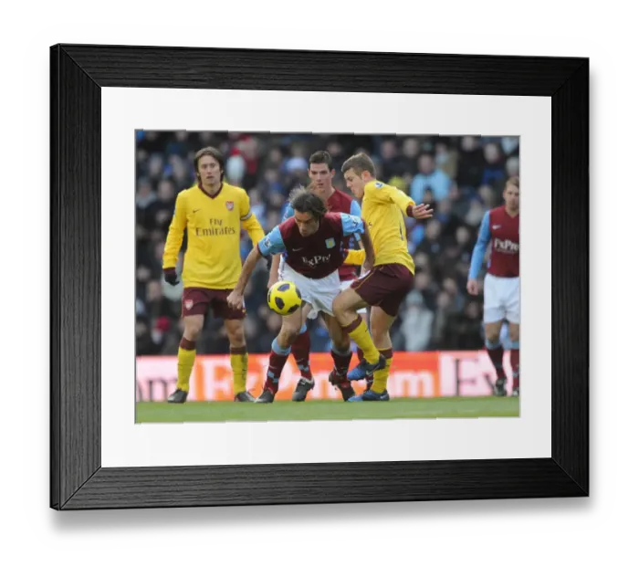 Framed Print : Jack Wilshere (Arsenal) Robert Pires (Villa). Aston Villa 2: 4 Arsenal. Barclays Premier League