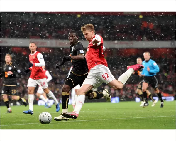 Nicklas Bendtner (Arsenal) Hendry Thomas (Wigan). Arsenal 2: 0 Wigan Athletic