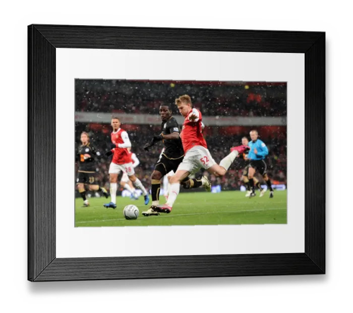 Framed Print : Nicklas Bendtner (Arsenal) Hendry Thomas (Wigan). Arsenal 2: 0 Wigan Athletic