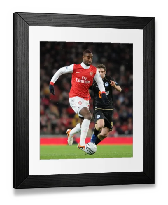 Framed Print : Johan Djourou (Arsenal) Mauro Boselli (Wigan). Arsenal 2: 0 Wigan Athletic