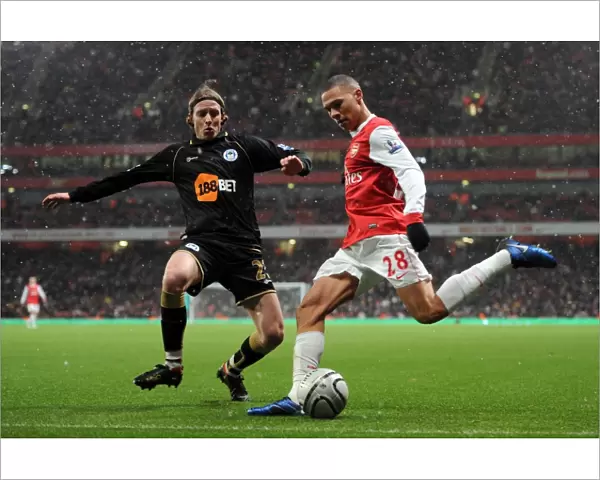 Kieran Gibbs (Arsenal) Ronnie Stam (Wigan). Arsenal 2: 0 Wigan Athletic