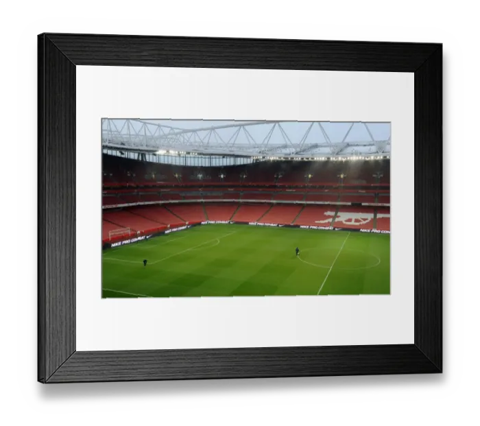 Framed Print : The Groundsman Prepares the Emirates Pitch for Arsenal's 2:0 Quarterfinal Victory over Wigan Athletic Framed Print : The Groundsman Prepares the Emirates Pitch for Arsenal's 2:0 Quarterfinal Victory over Wigan Athletic