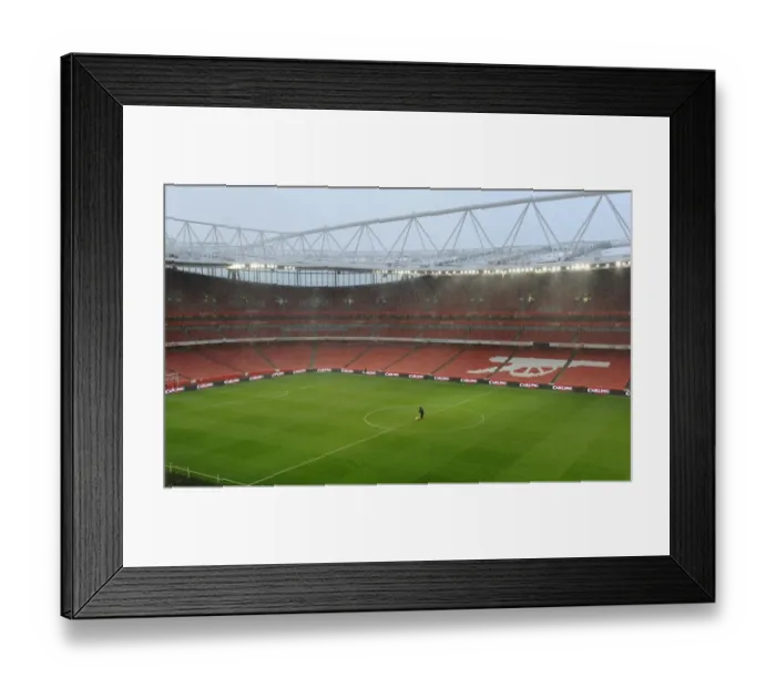 Framed Print : The Groundsman marks out the pitch before the match. Arsenal 2: 0 Wigan Athletic Framed Print : The Groundsman marks out the pitch before the match. Arsenal 2: 0 Wigan Athletic
