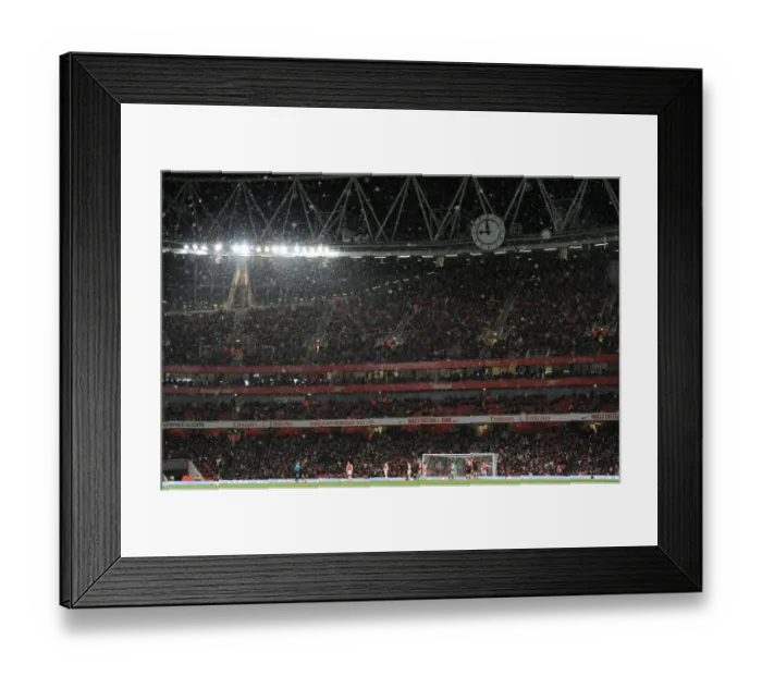 Framed Print : Snow fall during the match. Arsenal 2: 0 Wigan Athletic. Carling Cup, Quarter Final