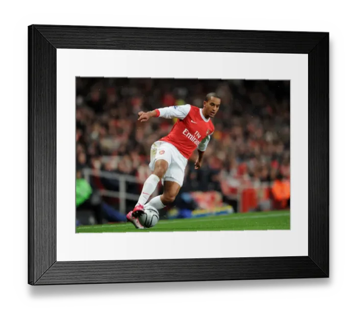Framed Print : Theo Walcott (Arsenal). Arsenal 2: 0 Wigan Athletic. Carling Cup, Quarter Final Framed Print : Theo Walcott (Arsenal). Arsenal 2: 0 Wigan Athletic. Carling Cup, Quarter Final