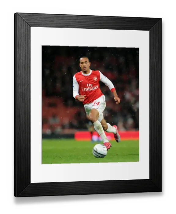 Framed Print : Theo Walcott's Brace: Arsenal Cruises Past Wigan Athletic in Carling Cup Quarterfinals Framed Print : Theo Walcott's Brace: Arsenal Cruises Past Wigan Athletic in Carling Cup Quarterfinals