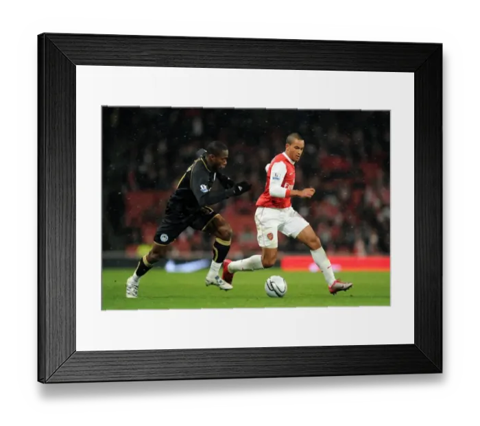 Framed Print : Theo Walcott Scores Against Maynor Figueroa: Arsenal's 2-0 Victory over Wigan Athletic in Carling Cup Quarterfinals