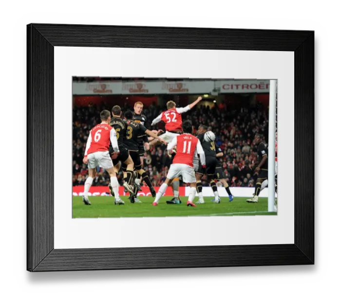 Framed Print : Antolin Alcaraz (Wigan) scores an own goal for Arsenals 1st goal. Arsenal 2 Framed Print : Antolin Alcaraz (Wigan) scores an own goal for Arsenals 1st goal. Arsenal 2