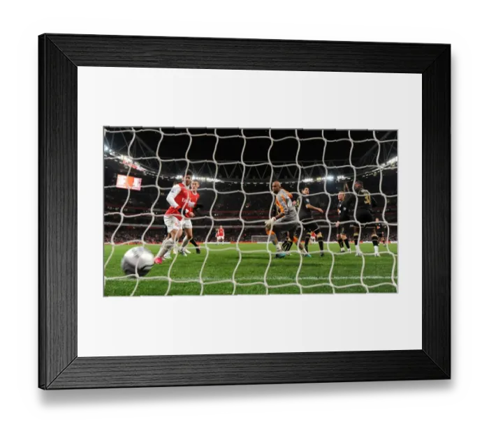 Framed Print : Antolin Alcaraz (Wigan No. 3) scores an own goal for Arsenals 1st goal