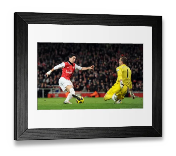 Framed Print : Samir Nasri beats Mark Schwarzer (Fulham) on his way to scoring his and Arsenals 2nd goal Framed Print : Samir Nasri beats Mark Schwarzer (Fulham) on his way to scoring his and Arsenals 2nd goal