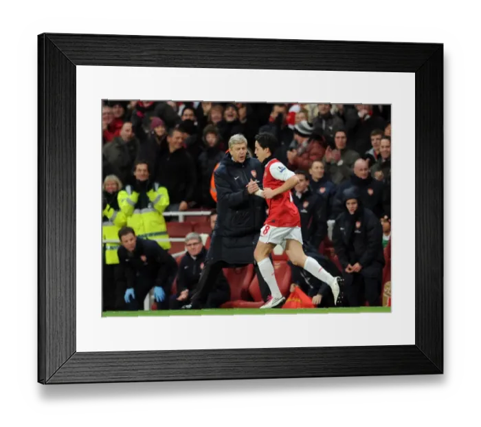 Framed Print : Arsene Wenger the Arsenal Manager congratulates Samir Nasri (Arsenal) on his 2nd goal Framed Print : Arsene Wenger the Arsenal Manager congratulates Samir Nasri (Arsenal) on his 2nd goal