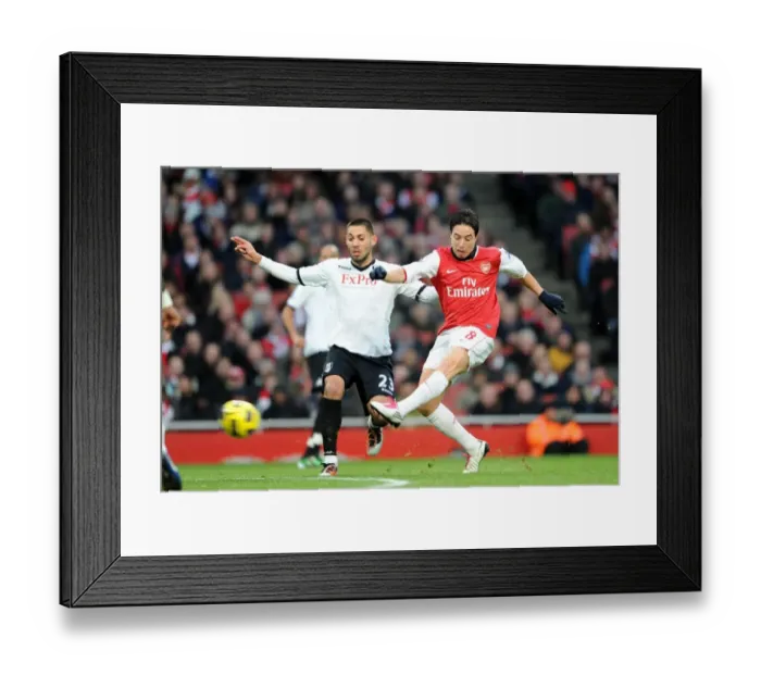 Framed Print : Samir Nasri (Arsenal) Clint Dempsey (Fulham). Arsenal 2: 1 Fulham. Barclays Premier League Framed Print : Samir Nasri (Arsenal) Clint Dempsey (Fulham). Arsenal 2: 1 Fulham. Barclays Premier League