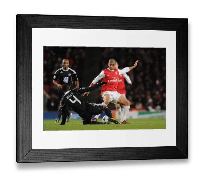 Framed Print : Arsenal Triumphs Over Partizan Belgrade in UEFA Champions League: Denilson Shines
