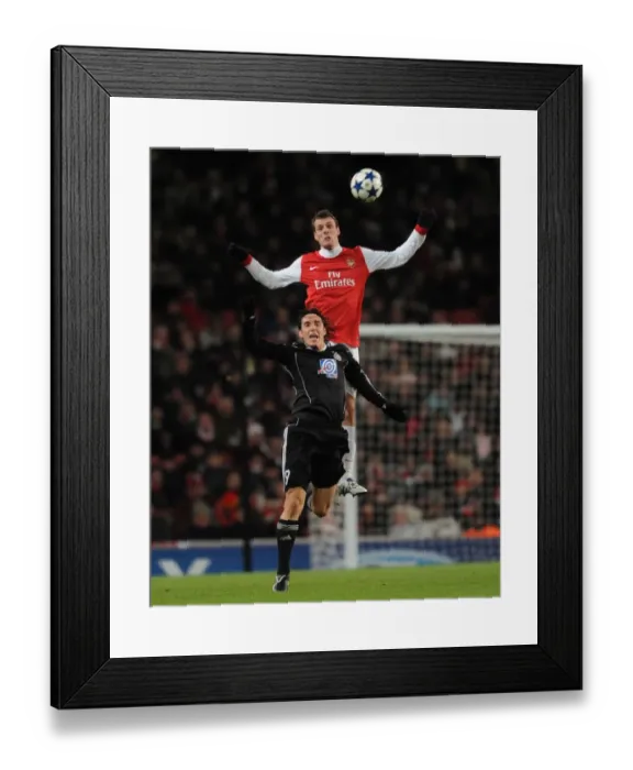 Framed Print : Sebastien Squillaci (Arsenal) Cleo (Partizan). Arsenal 3: 1 Partizan Belgrade Framed Print : Sebastien Squillaci (Arsenal) Cleo (Partizan). Arsenal 3: 1 Partizan Belgrade