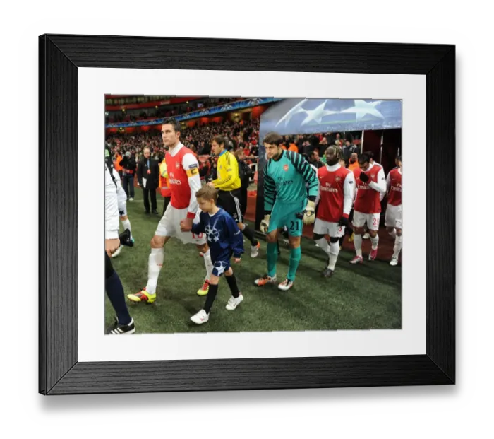 Framed Print : Arsenal captain Robin van Persie leads out the team. Arsenal 3: 1 Partizan Belgrade