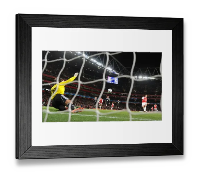 Framed Print : Robin van Persie shoots past Partizan goalkeeper Vladimir Stojkovic to score the 1st Arsenal goal Framed Print : Robin van Persie shoots past Partizan goalkeeper Vladimir Stojkovic to score the 1st Arsenal goal