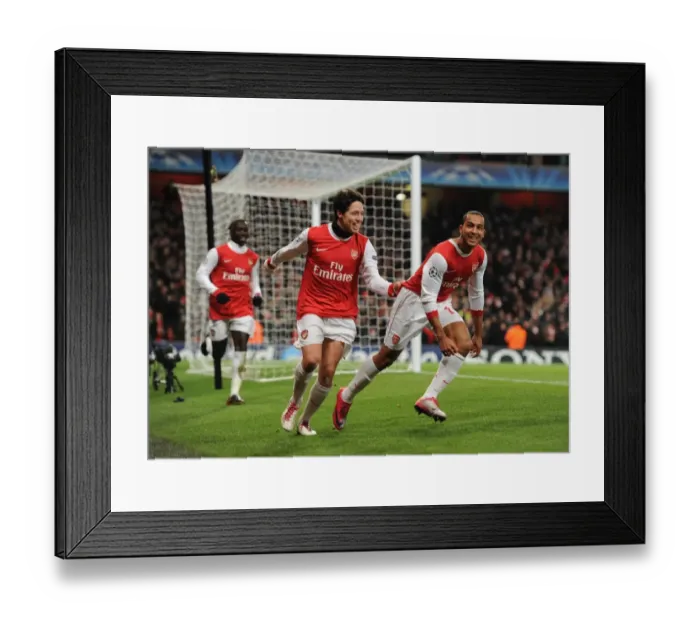 Framed Print : Theo Walcott celebrates scoring the 2nd Arsenal goal with Samir Nasri. Arsenal 3