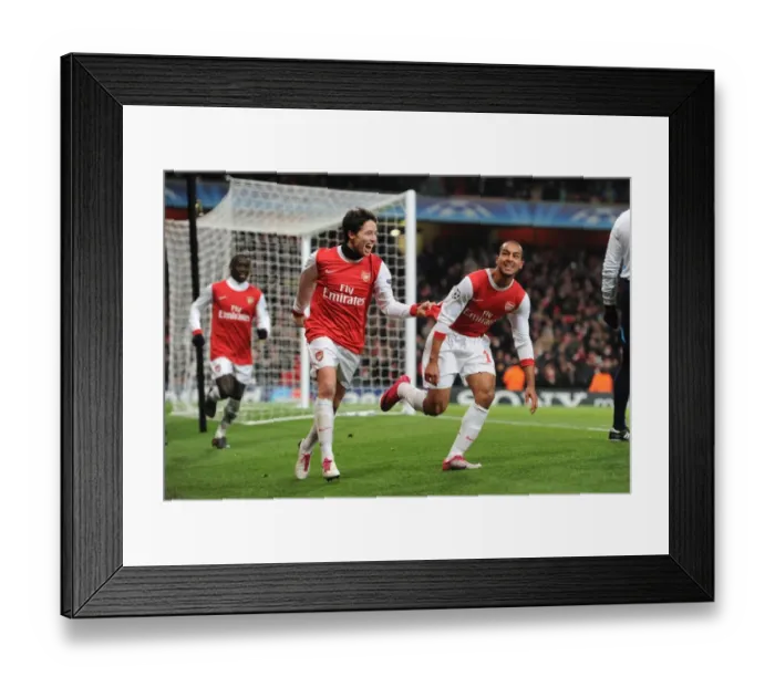 Framed Print : Theo Walcott and Samir Nasri: Arsenal's Dynamic Duo Celebrates Goal in Arsenal 3-1 Victory over Partizan Belgrade, UEFA Champions League, Emirates Stadium