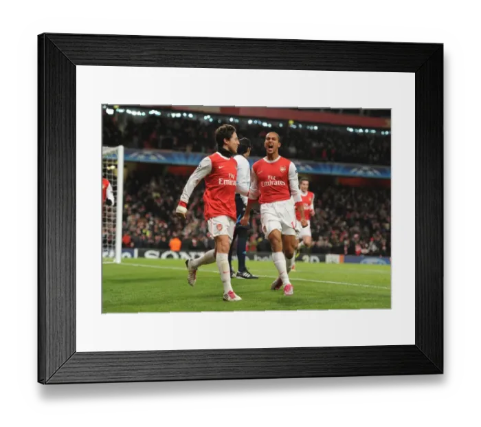 Framed Print : Theo Walcott and Samir Nasri Celebrate Arsenal's Second Goal vs. Partizan Belgrade in the UEFA Champions League