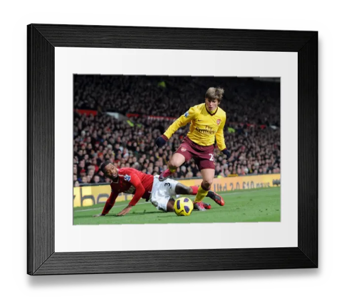 Framed Print : Arshavin vs. Evra: Manchester United Edge Past Arsenal in Premier League Clash