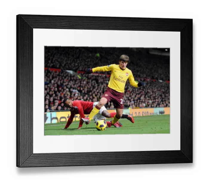 Framed Print : Andrey Arshavin (Arsenal) Patrice Evra (Man Utd). Manchester United 1: 0 Arsenal Framed Print : Andrey Arshavin (Arsenal) Patrice Evra (Man Utd). Manchester United 1: 0 Arsenal