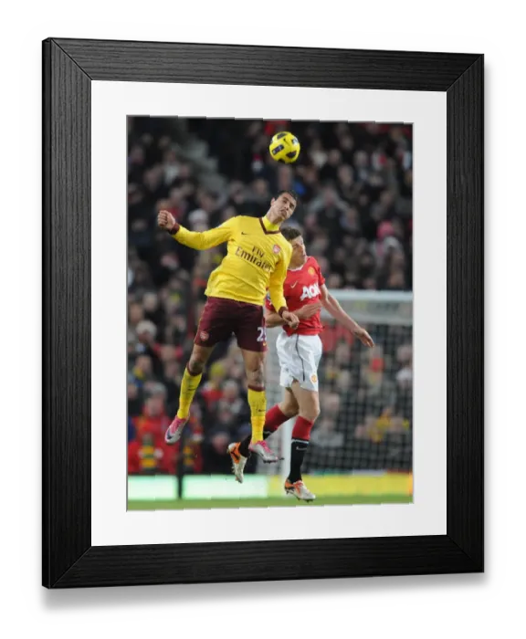 Framed Print : Marouane Chamakh (Arsenal) Michael Carrick (Man United). Manchester United 1: 0 Arsenal