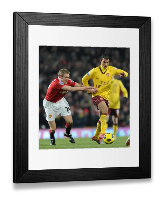 Framed Print : Marouane Chamakh (Arsenal) Darren Fletcher (Man Utd). Manchester United 1: 0 Arsenal Framed Print : Marouane Chamakh (Arsenal) Darren Fletcher (Man Utd). Manchester United 1: 0 Arsenal