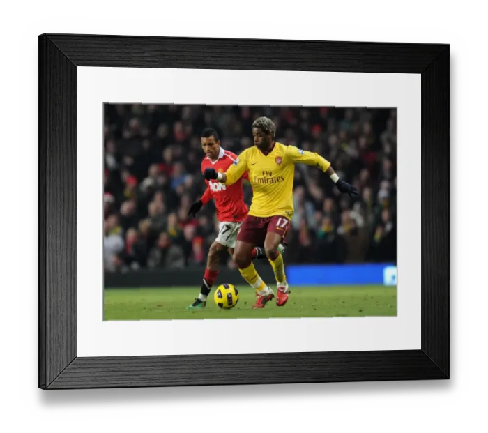 Framed Print : Alex Song (Arsenal) Nani (Man Utd). Manchester United 1: 0 Arsenal. Barclays Premier League