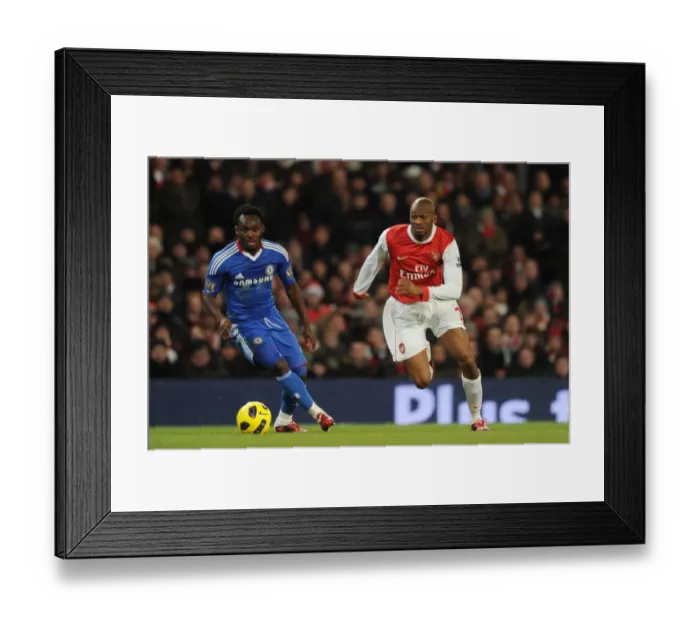 Framed Print : Arsenal's Abou Diaby and Chelsea's Michael Essien Clash in Intense Barclays Premier League Match: Arsenal 3:1 Chelsea, Emirates Stadium (December 27, 2010) Framed Print : Arsenal's Abou Diaby and Chelsea's Michael Essien Clash in Intense Barclays Premier League Match: Arsenal 3:1 Chelsea, Emirates Stadium (December 27, 2010)